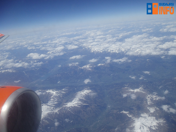 repulo_repules_utazas_felhok_havas_hegyek